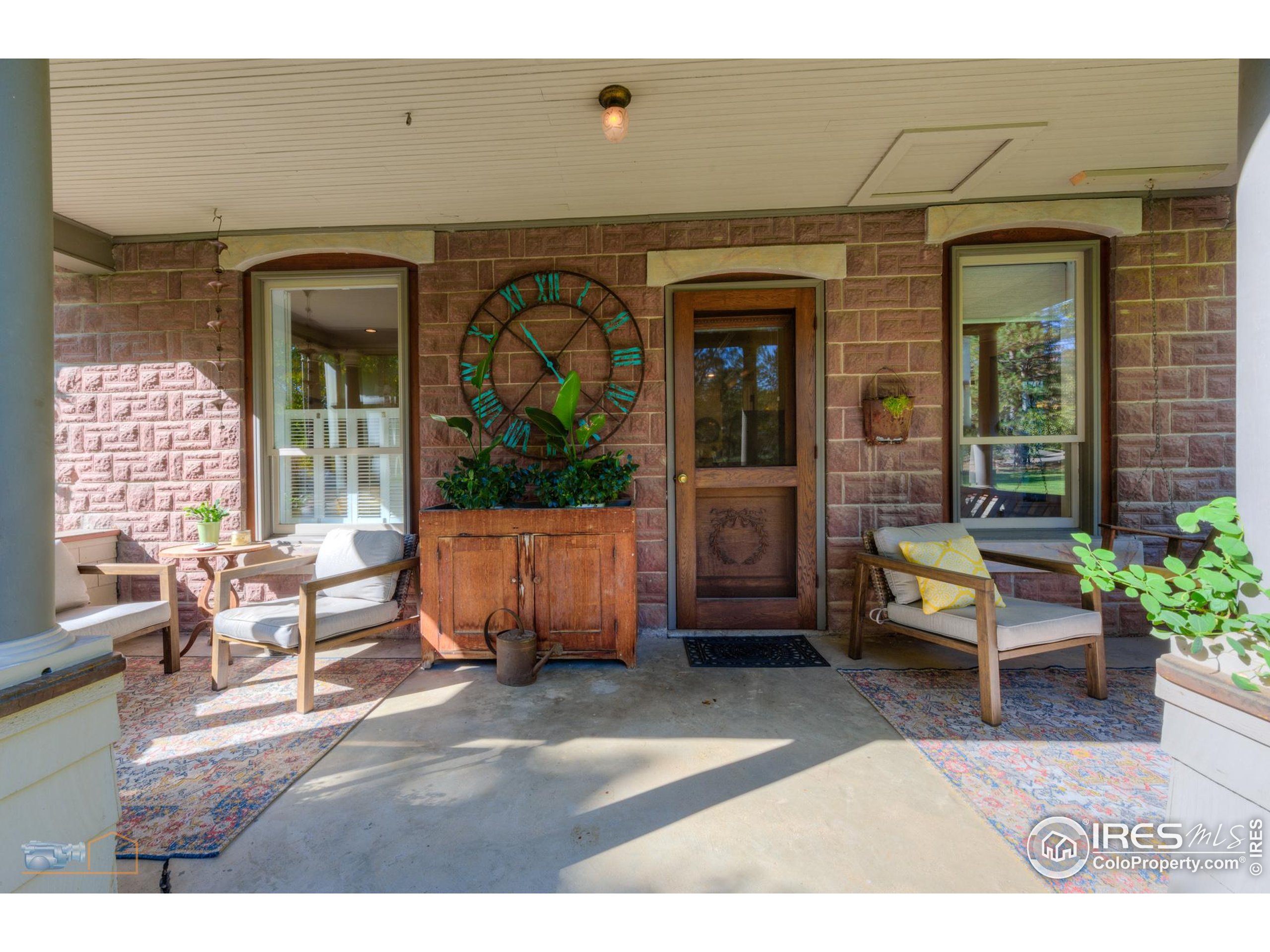 3737 26th Street Boulder, CO 80304 - Photo 35 of 47 a living room with furniture and a potted plant