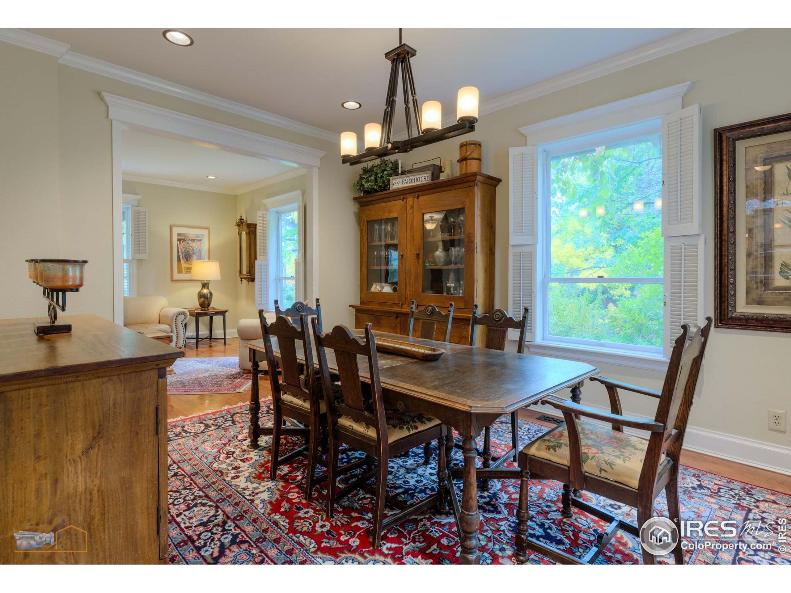 3737 26th Street Boulder, CO 80304 - Photo 8 of 47 a view of a dining room with furniture window and outside view
