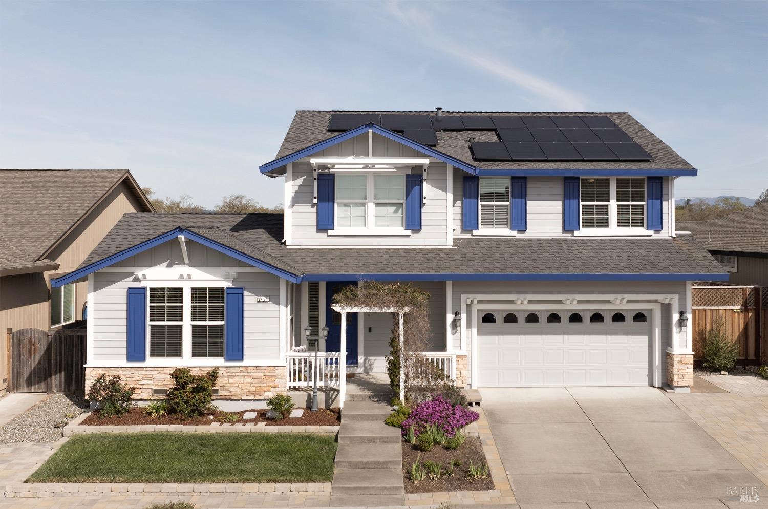 8465 Trione Circle Windsor, CA 95492 - Photo 1 of 1 a front view of a house with a yard and outdoor seating