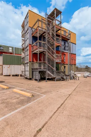 a view of a building with a street