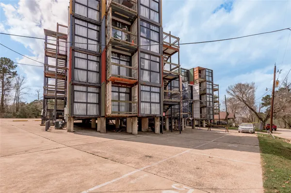 a view of balcony with wooden floor