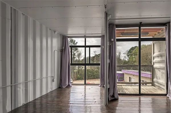 a kitchen with a refrigerator and a sink