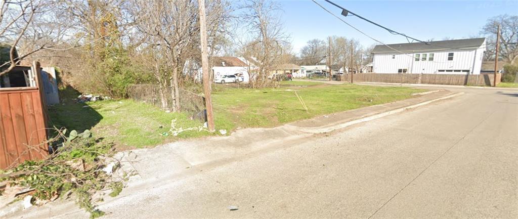 1502 Morris Street Dallas, TX 75212 - Photo 4 of 5 a view of a street with houses