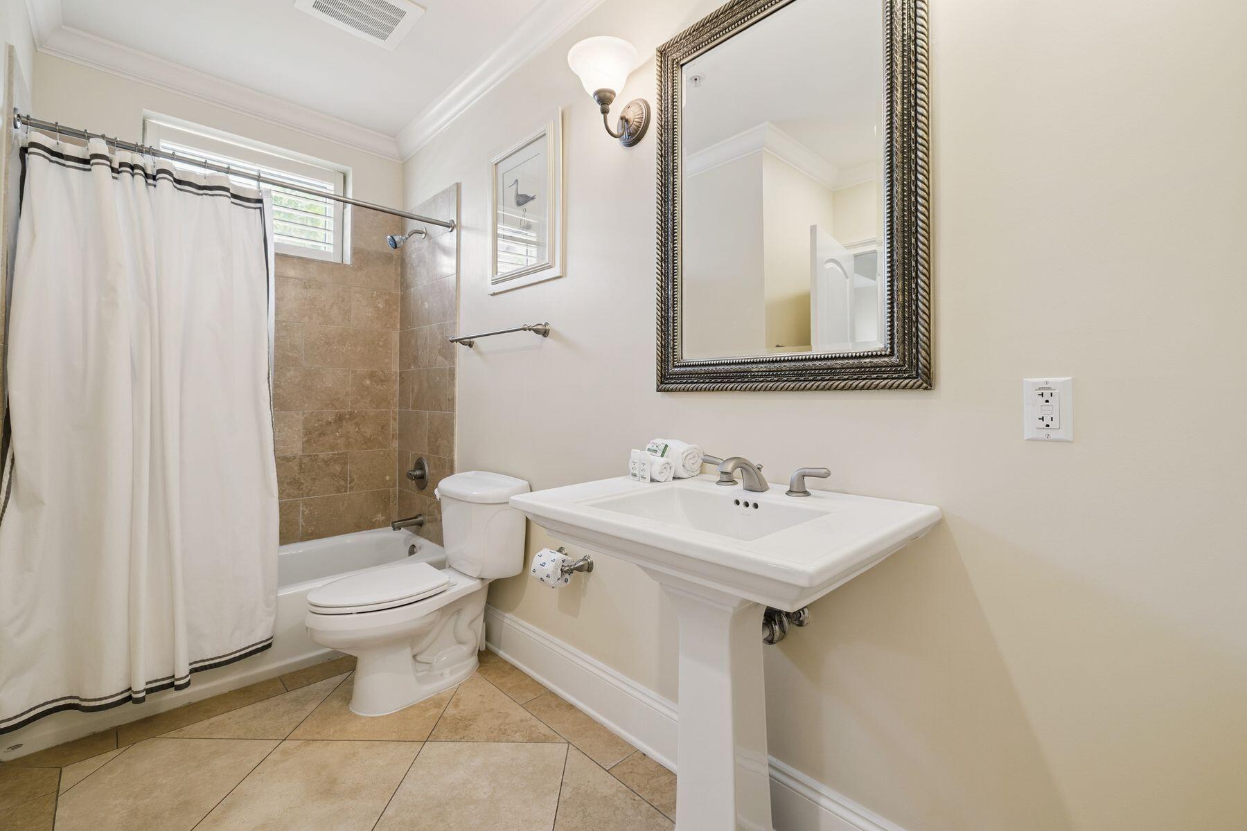 2421 West County Highway 30A, Unit D101 Santa Rosa Beach, FL 32459 - Photo 21 of 44 a bathroom with a sink toilet and shower