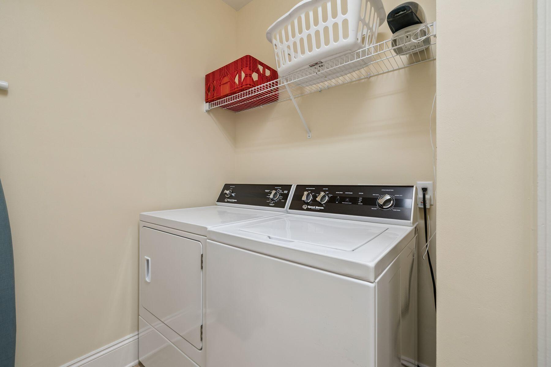 2421 West County Highway 30A, Unit D101 Santa Rosa Beach, FL 32459 - Photo 23 of 44 a utility room with dryer and washer