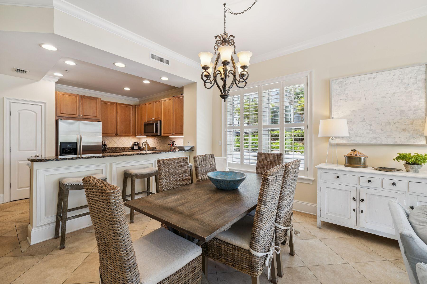 2421 West County Highway 30A, Unit D101 Santa Rosa Beach, FL 32459 - Photo 26 of 44 a view of a dining room with furniture window and outside view