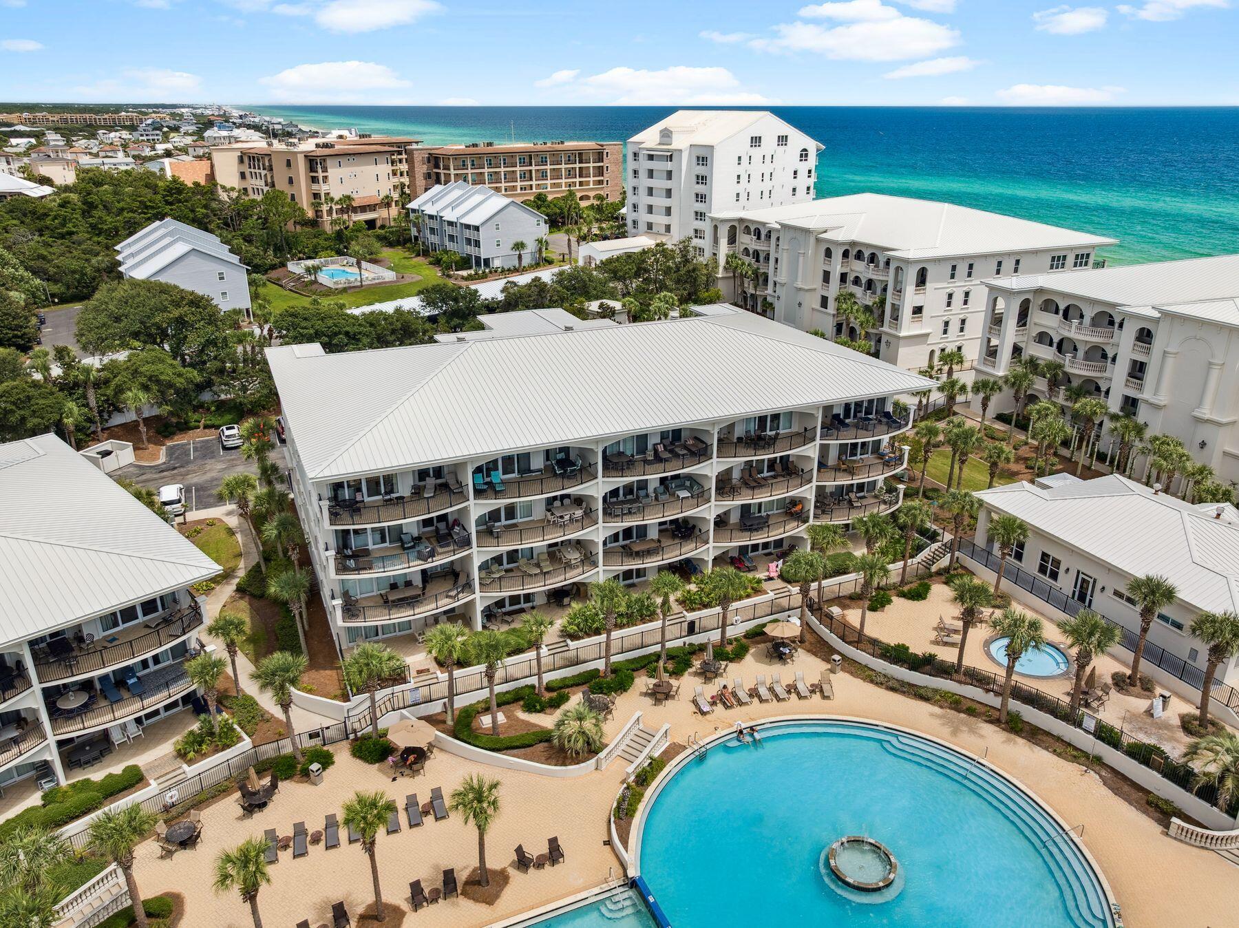 2421 West County Highway 30A, Unit D101 Santa Rosa Beach, FL 32459 - Photo 37 of 44 a view of a swimming pool with outdoor seating