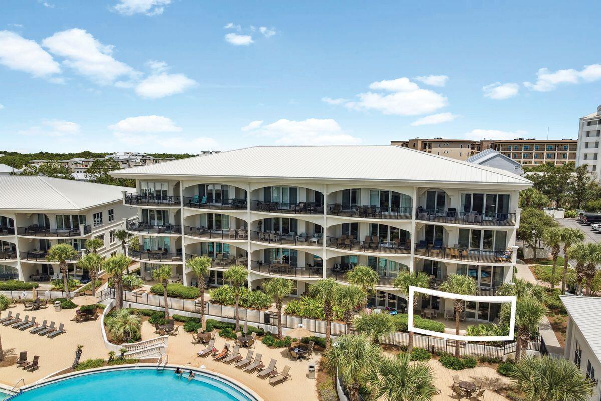 2421 West County Highway 30A, Unit D101 Santa Rosa Beach, FL 32459 - Photo 5 of 44 a view of a building with a lot of windows