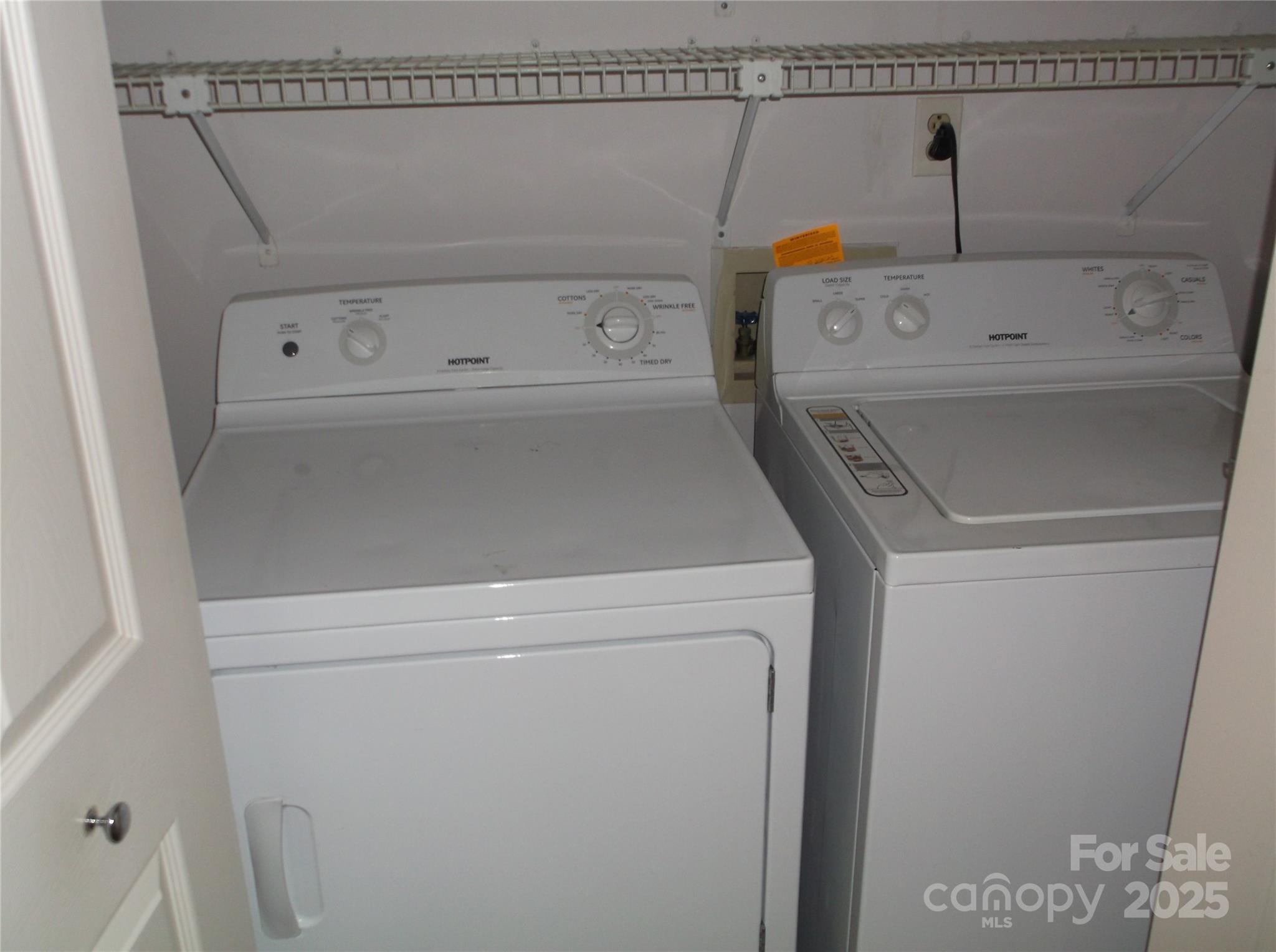 5007 Sharon Road, Unit O Charlotte, NC 28210 - Photo 15 of 20 a utility room with dryer and washer