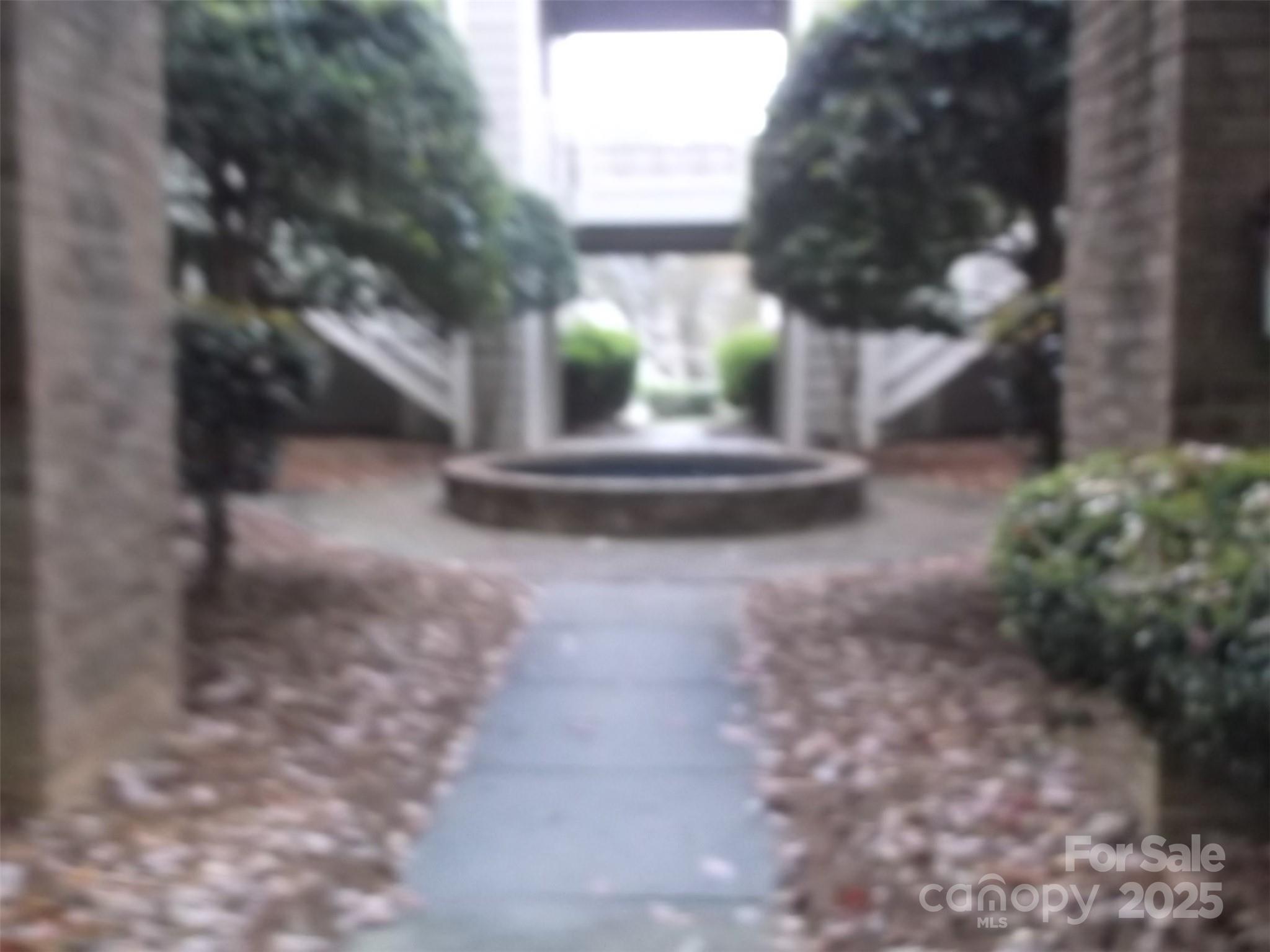 5007 Sharon Road, Unit O Charlotte, NC 28210 - Photo 20 of 20 a view of a yard