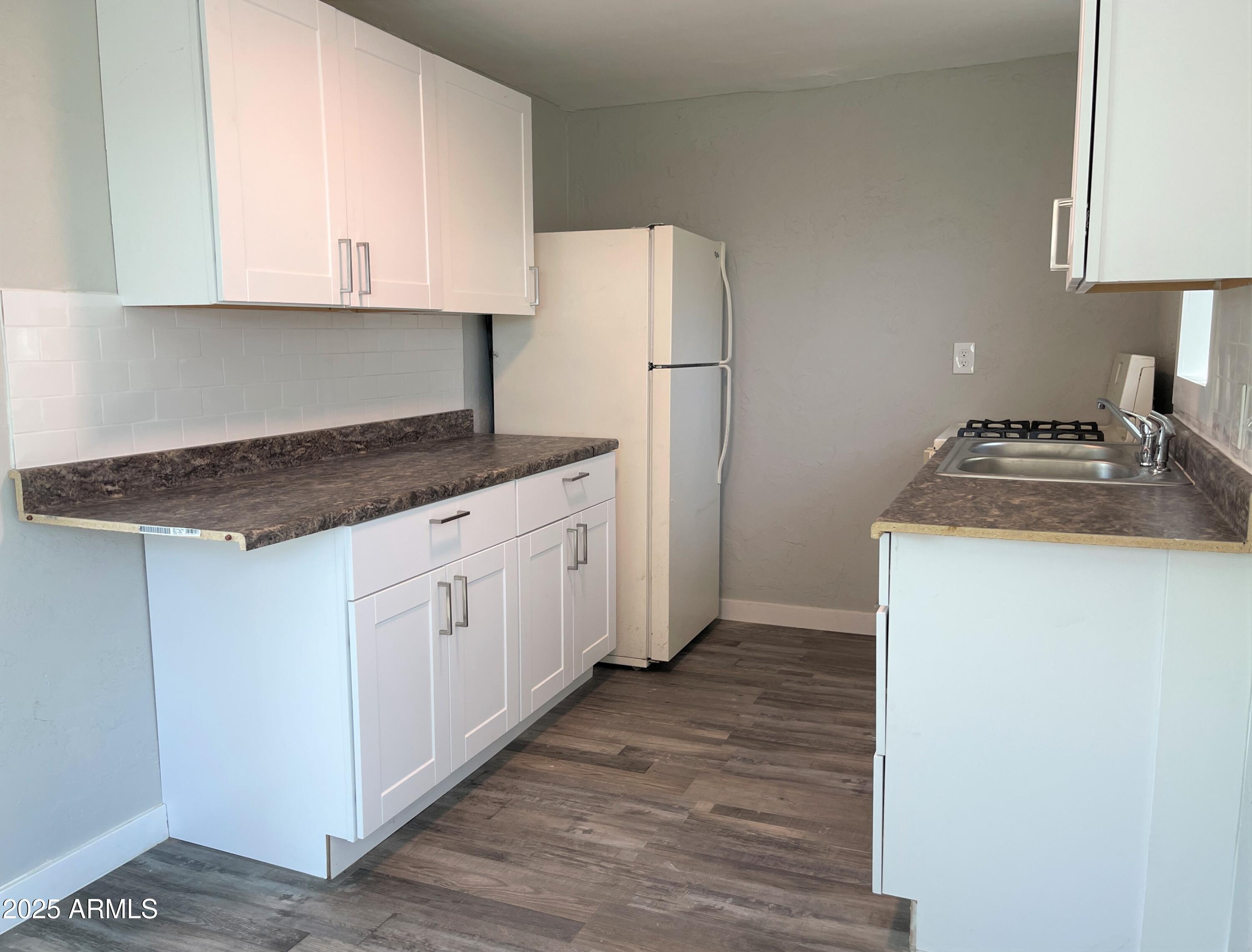 1125 East Devonshire Avenue, Unit 7 Phoenix, AZ 85014 - Photo 6 of 10 IMG_3697