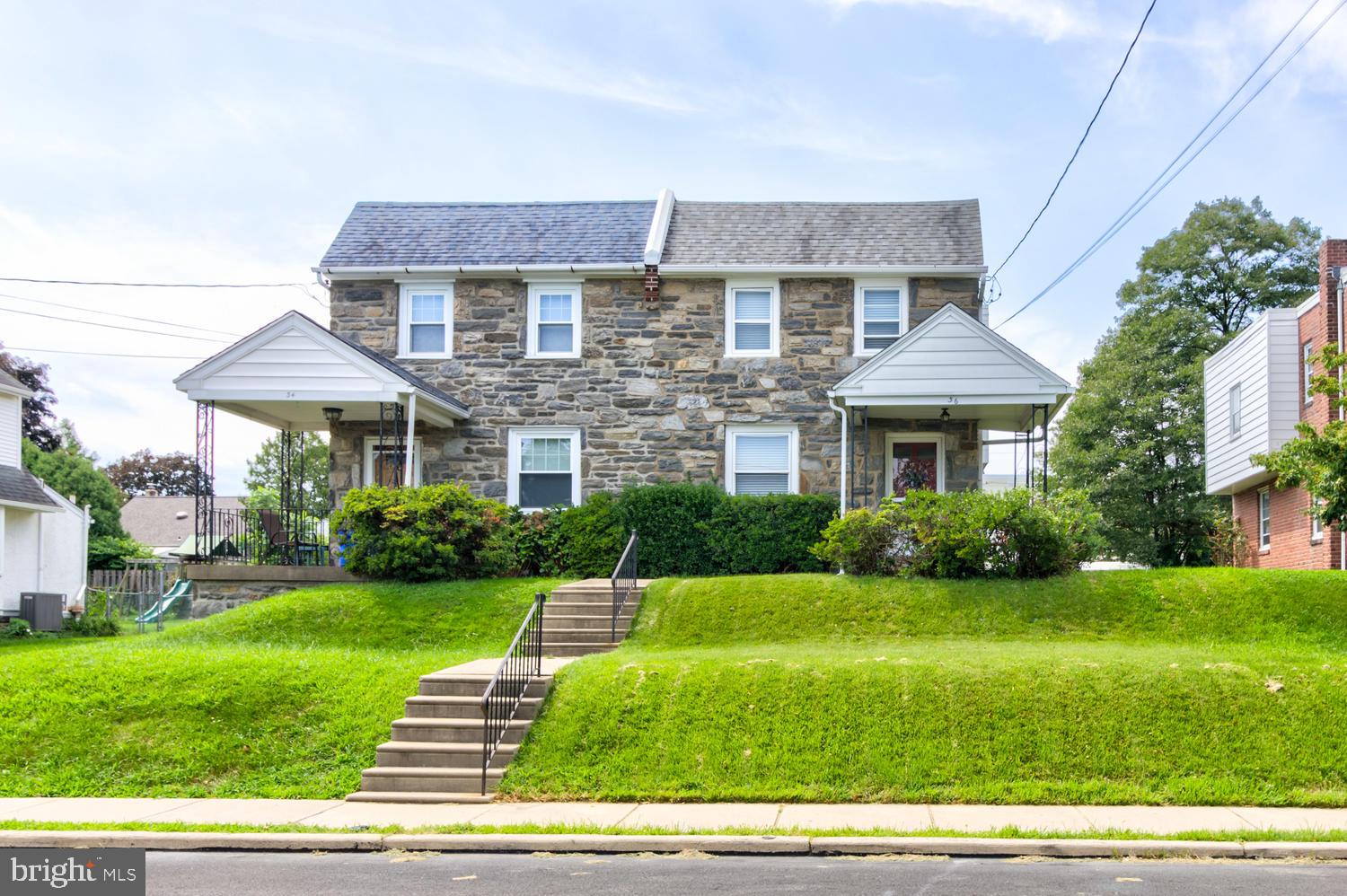 36 Woodbine Road Havertown, PA 19083 - Photo 1 of 34 a front view of a house with a yard