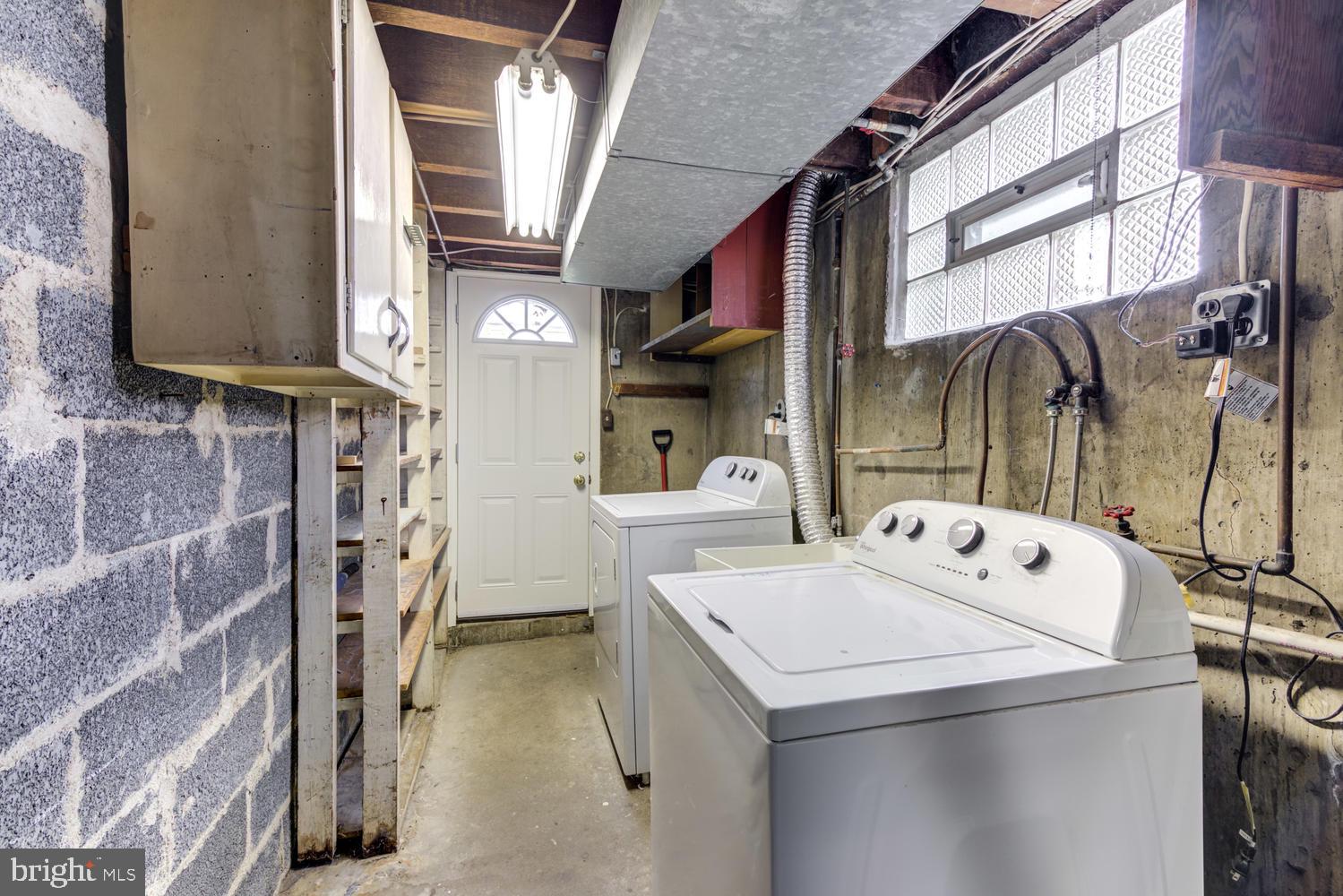 36 Woodbine Road Havertown, PA 19083 - Photo 14 of 34 a utility room with dryer and washer