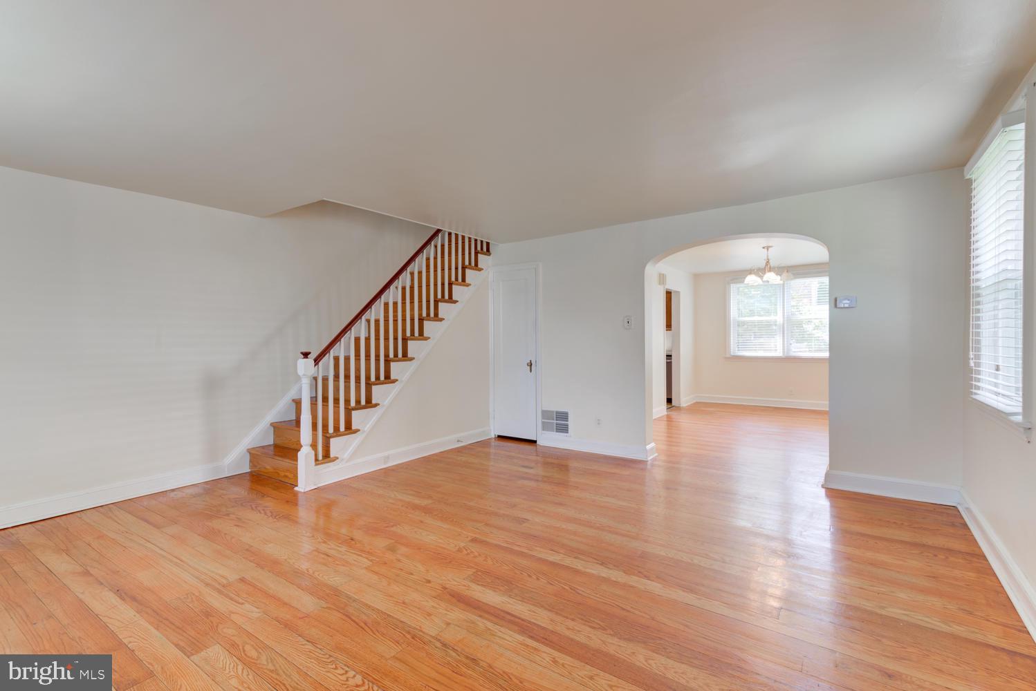 36 Woodbine Road Havertown, PA 19083 - Photo 22 of 34 a view of an empty room with wooden floor and fan