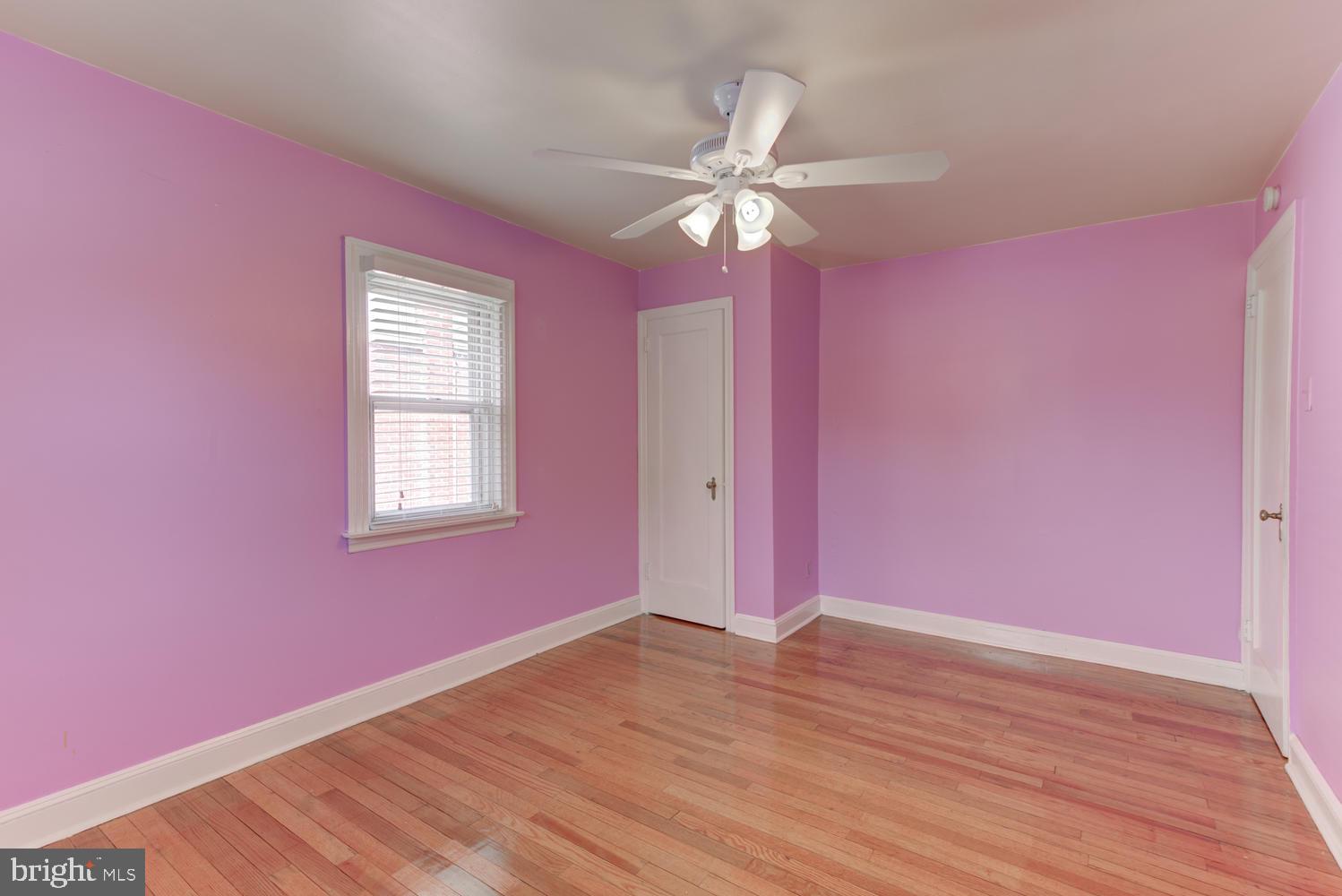 36 Woodbine Road Havertown, PA 19083 - Photo 29 of 34 a view of empty room with wooden floor and fan