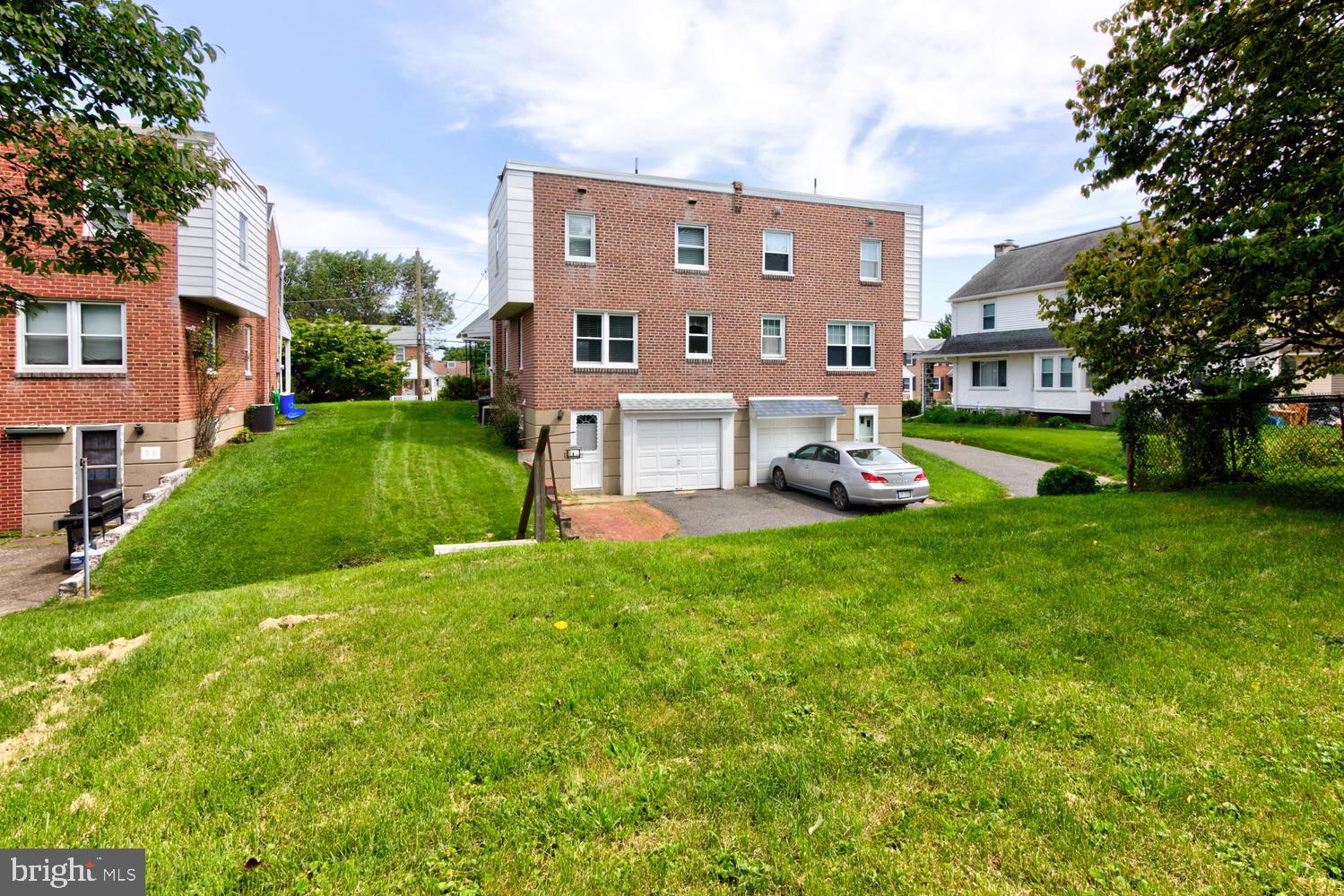 36 Woodbine Road Havertown, PA 19083 - Photo 6 of 34 a front view of building with yard