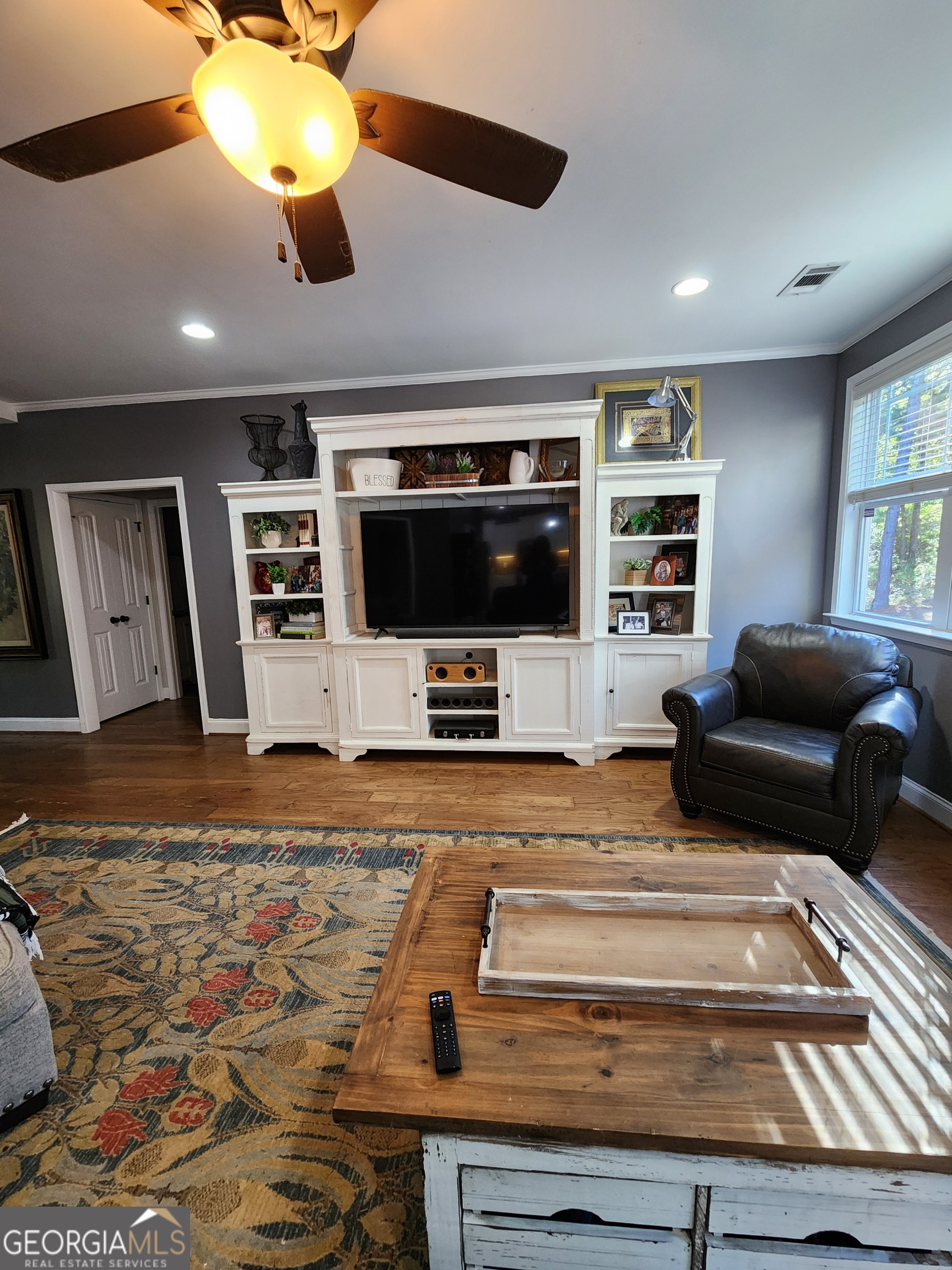 249 Serenity Loop Cataula, GA 31804 - Photo 11 of 44 a living room with furniture and a flat screen tv
