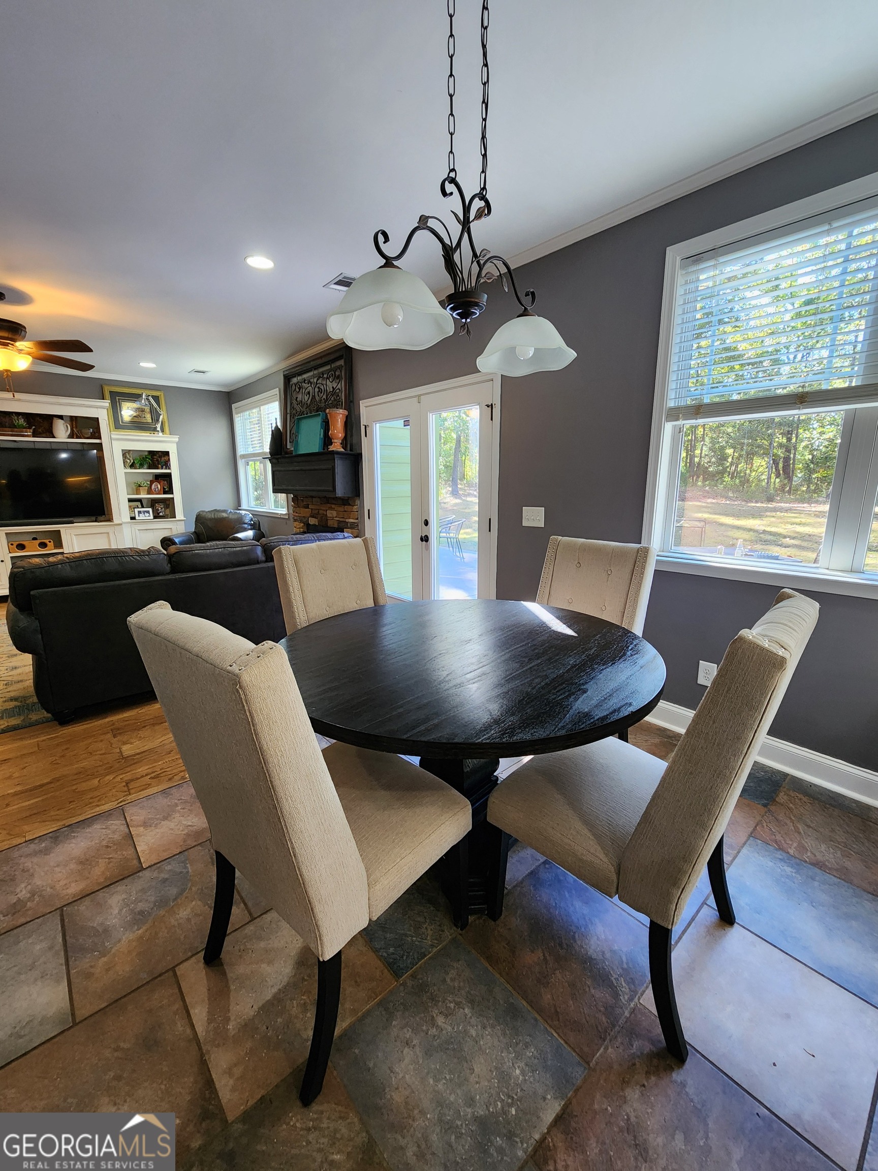 249 Serenity Loop Cataula, GA 31804 - Photo 19 of 44 a view of a dining room with furniture