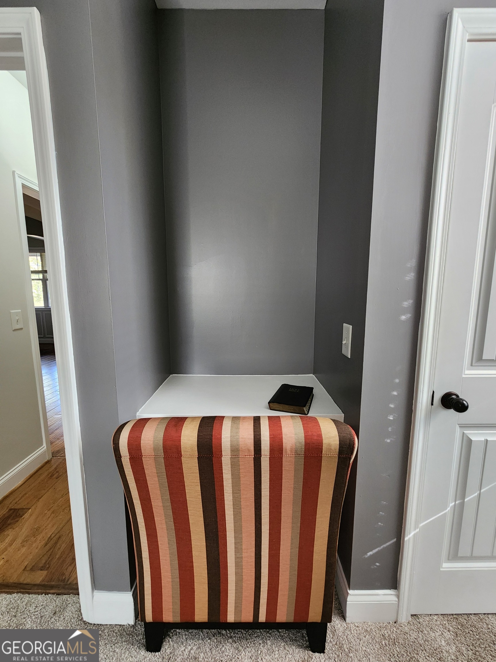 249 Serenity Loop Cataula, GA 31804 - Photo 24 of 44 a bedroom with a bed and a mirror