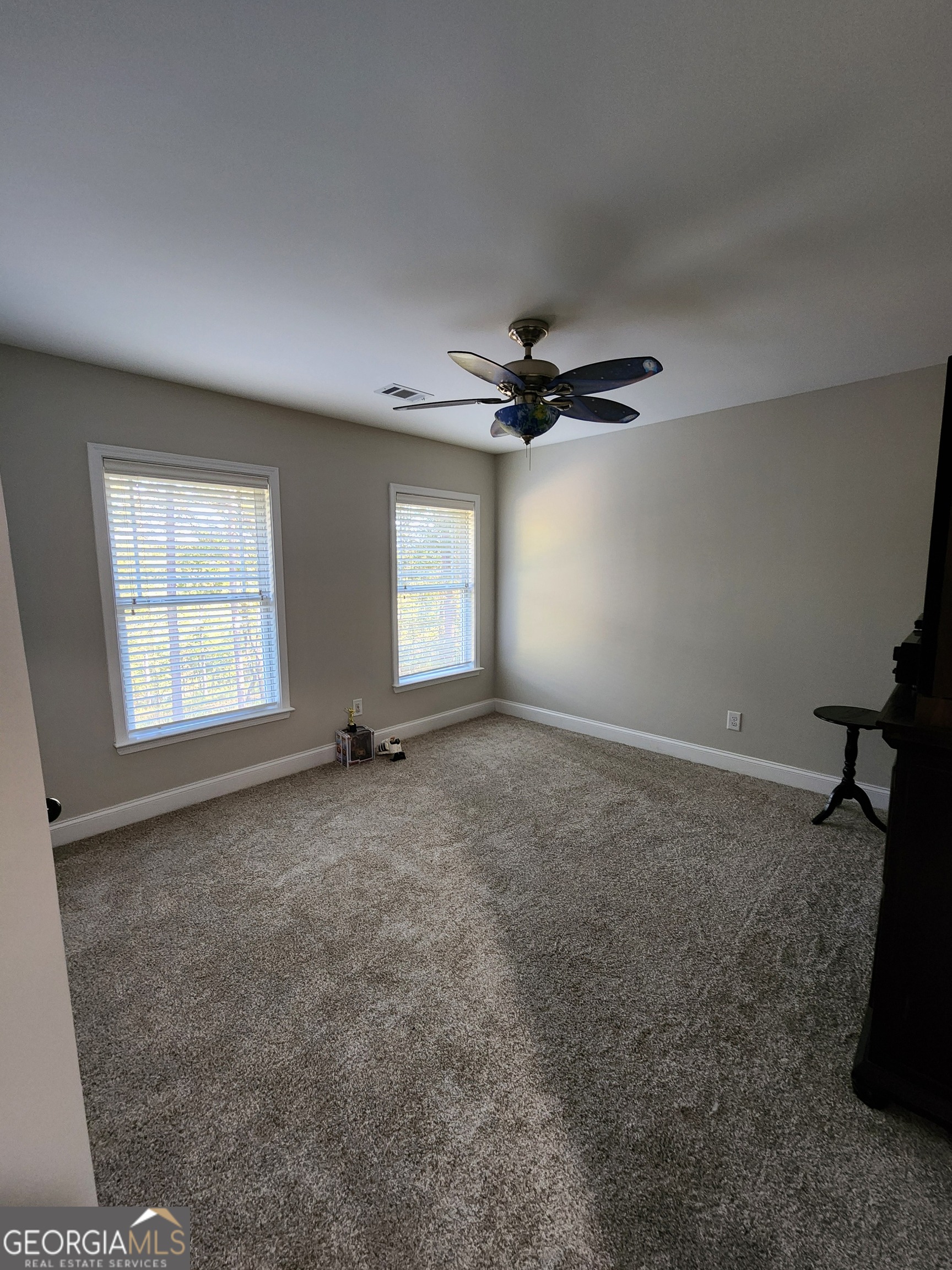 249 Serenity Loop Cataula, GA 31804 - Photo 28 of 44 a view of an empty room with a window