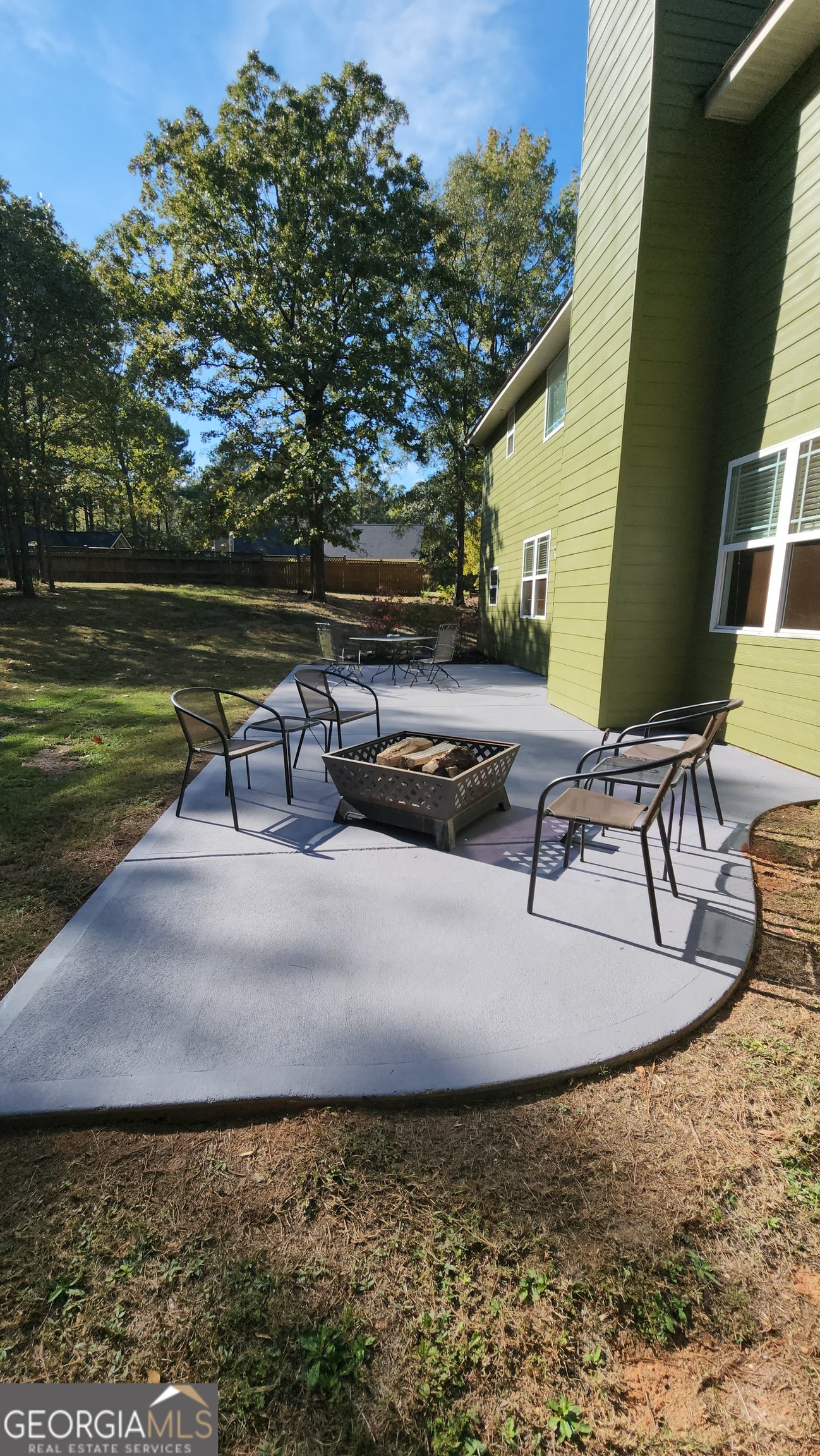 249 Serenity Loop Cataula, GA 31804 - Photo 40 of 44 a view of a swimming pool with a patio and a yard
