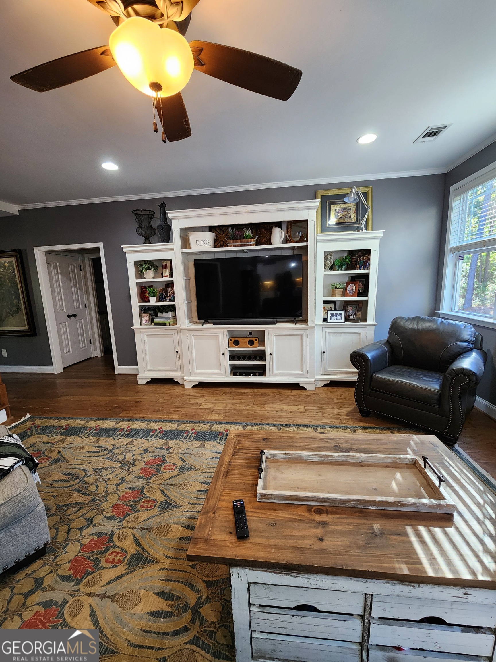 249 Serenity Loop Cataula, GA 31804 - Photo 10 of 44 a living room with furniture and a flat screen tv