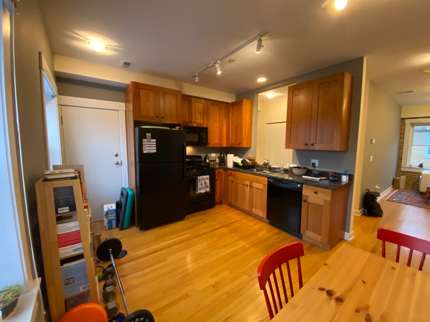 2539.5 Prairie Avenue, Unit 3W Evanston, IL 60201 - Photo 4 of 6 a kitchen with stainless steel appliances granite countertop a refrigerator and a stove top oven