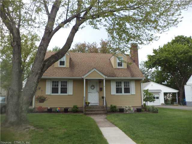 18 Bonner Road Manchester, CT 06042 - Photo 1 of 1 a front view of a house with a garden