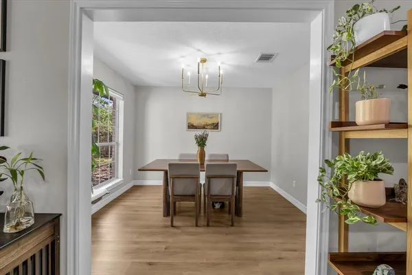 a kitchen with granite countertop a sink and a window