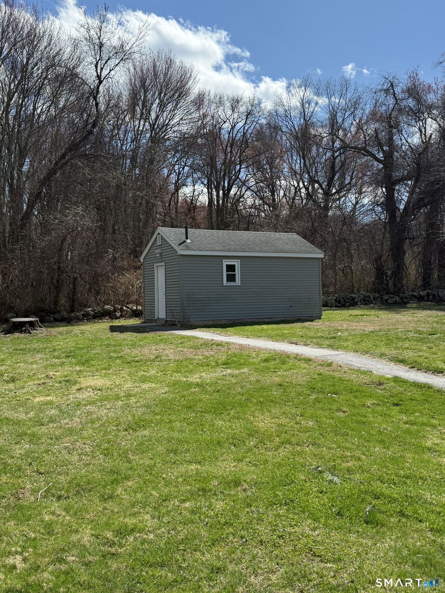 127 Black Point Road, Unit 31 East Lyme, CT 06357 - Photo 6 of 12 Common building houses washers and dryers.