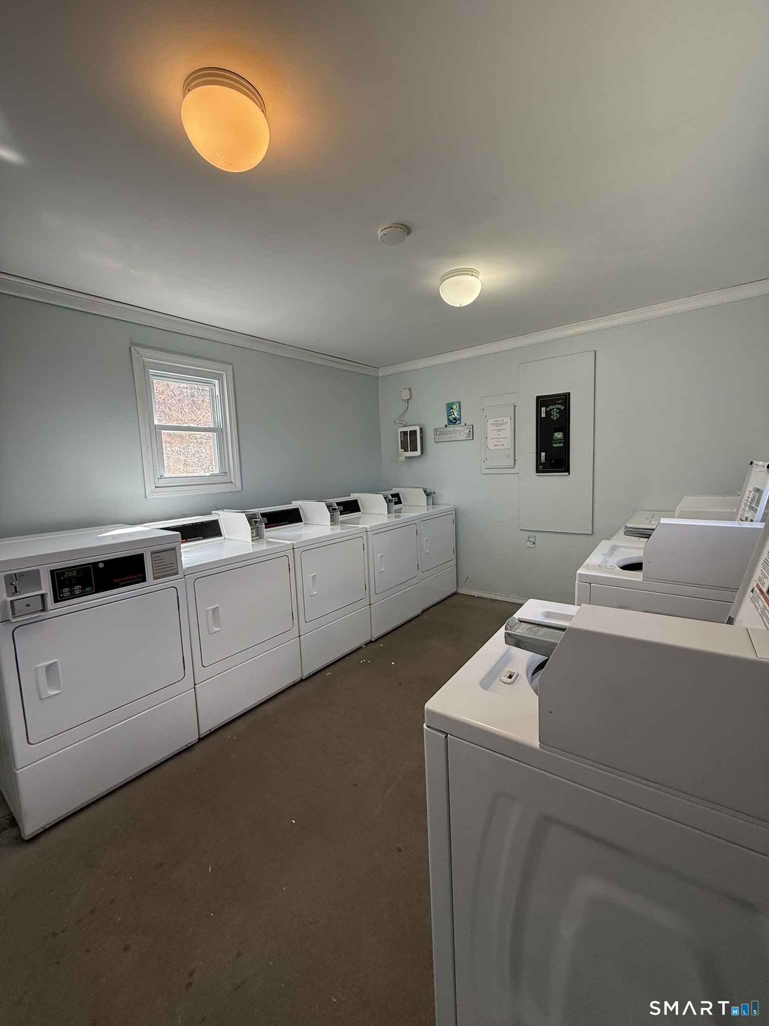 127 Black Point Road, Unit 31 East Lyme, CT 06357 - Photo 7 of 12 Coin operated washers and dryers.