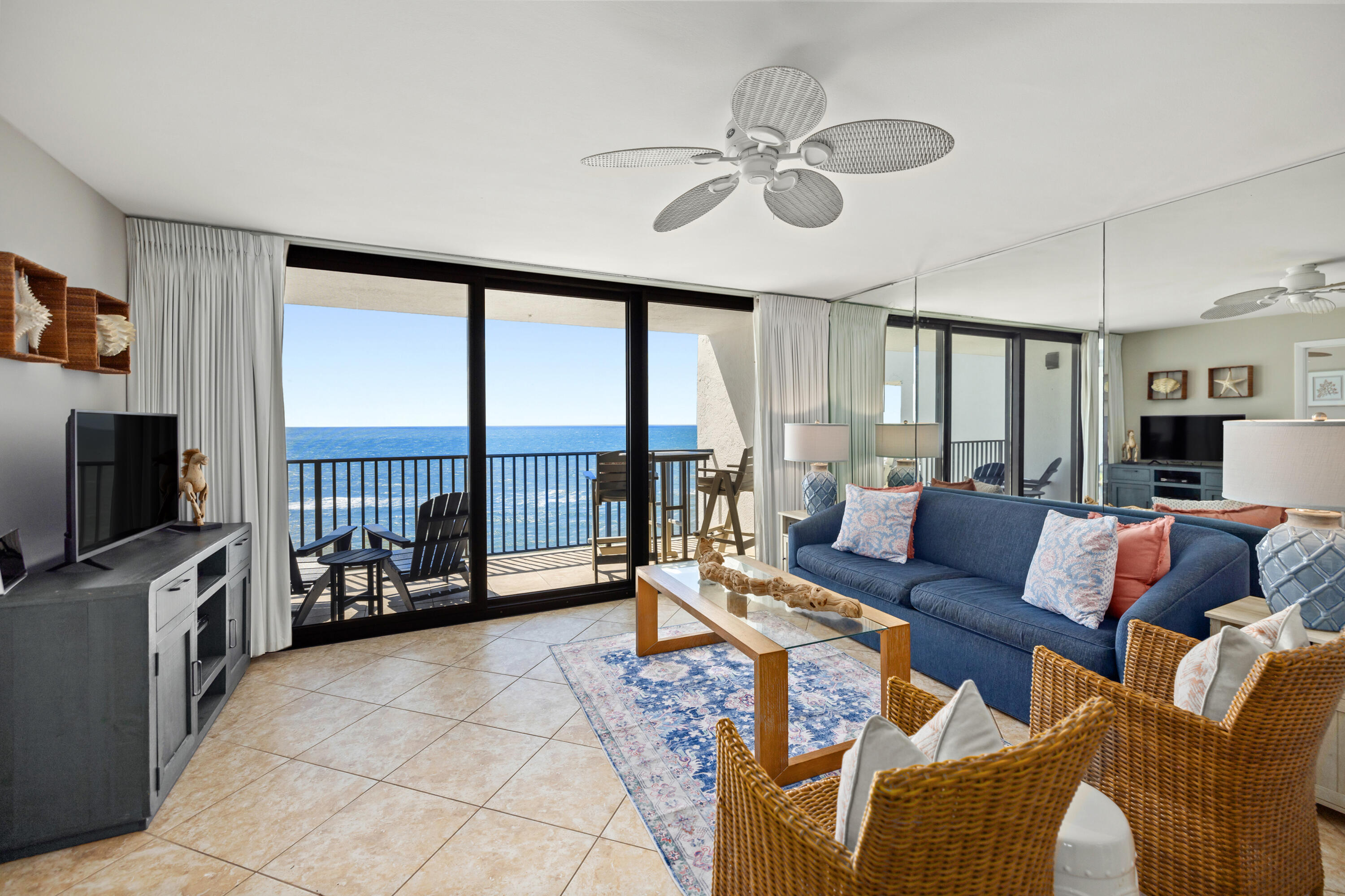 4100 East County Highway 30A, Unit 1003 Santa Rosa Beach, FL 32459 - Photo 2 of 24 a living room with furniture and a flat screen tv