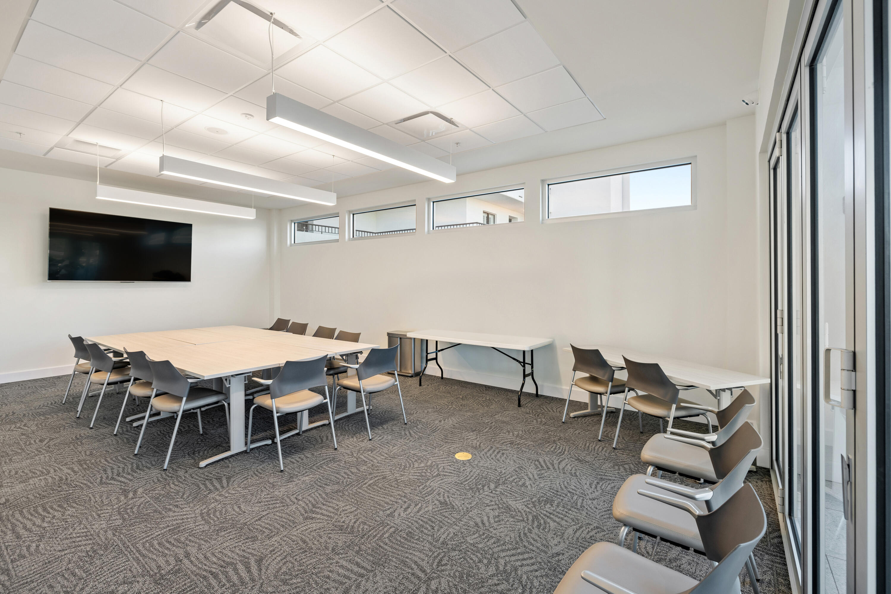4100 East County Highway 30A, Unit 1003 Santa Rosa Beach, FL 32459 - Photo 23 of 24 a dining room with furniture and a flat screen tv