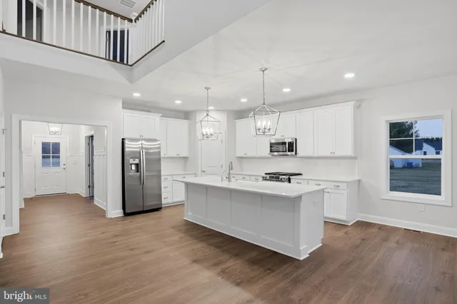 a bathroom with a toilet sink and shower