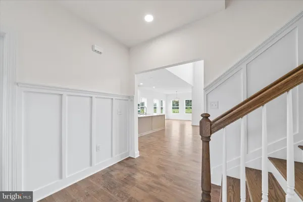 a view of an empty room with windows
