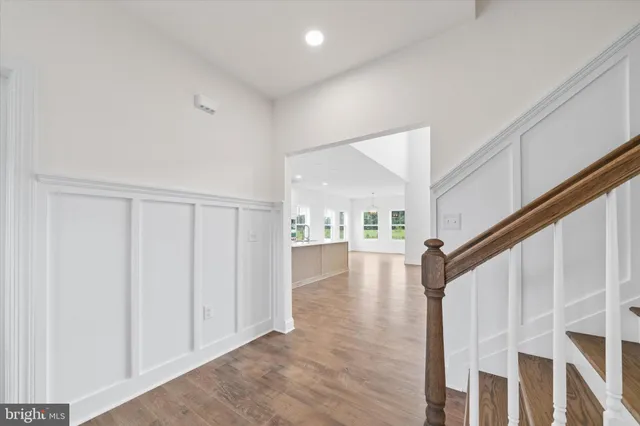 a view of an empty room with windows