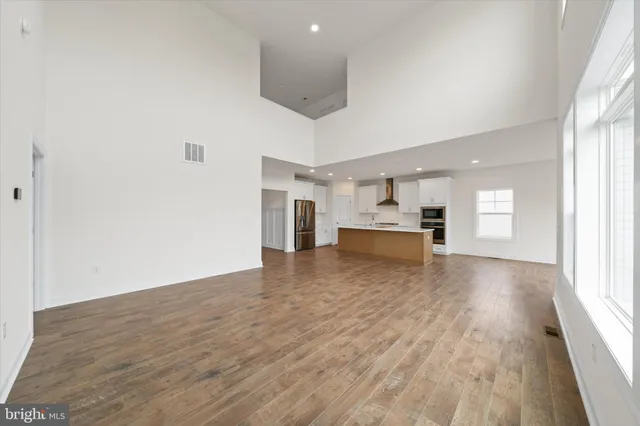 a view of a room with white walls