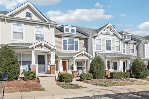 a front view of a large white building