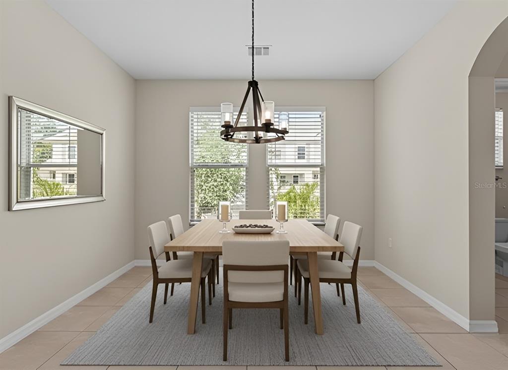 800 Callista Cay Loop Tarpon Springs, FL 34689 - Photo 13 of 36 a dining room with furniture and window
