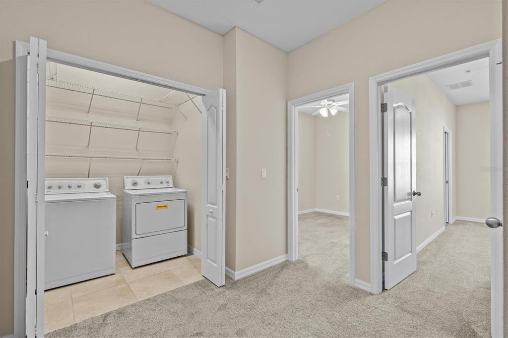 800 Callista Cay Loop Tarpon Springs, FL 34689 - Photo 20 of 36 a view of utility room with dryer and washer