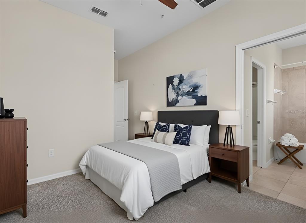 800 Callista Cay Loop Tarpon Springs, FL 34689 - Photo 21 of 36 a bedroom with a bed and a window