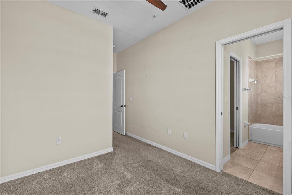 800 Callista Cay Loop Tarpon Springs, FL 34689 - Photo 25 of 36 a view of a room with a wardrobe space