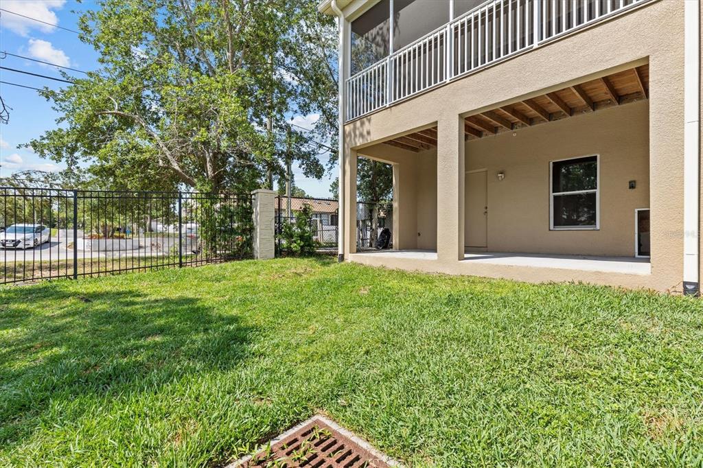800 Callista Cay Loop Tarpon Springs, FL 34689 - Photo 31 of 36 a view of a house with a backyard