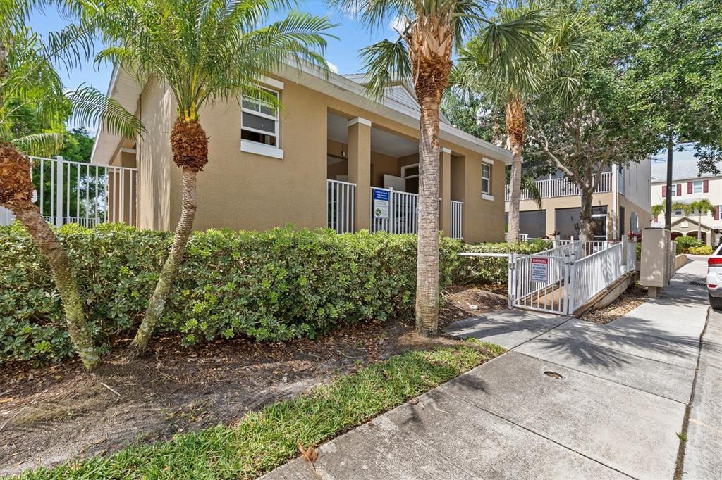 800 Callista Cay Loop Tarpon Springs, FL 34689 - Photo 32 of 36 a view of a small yard in front of a house