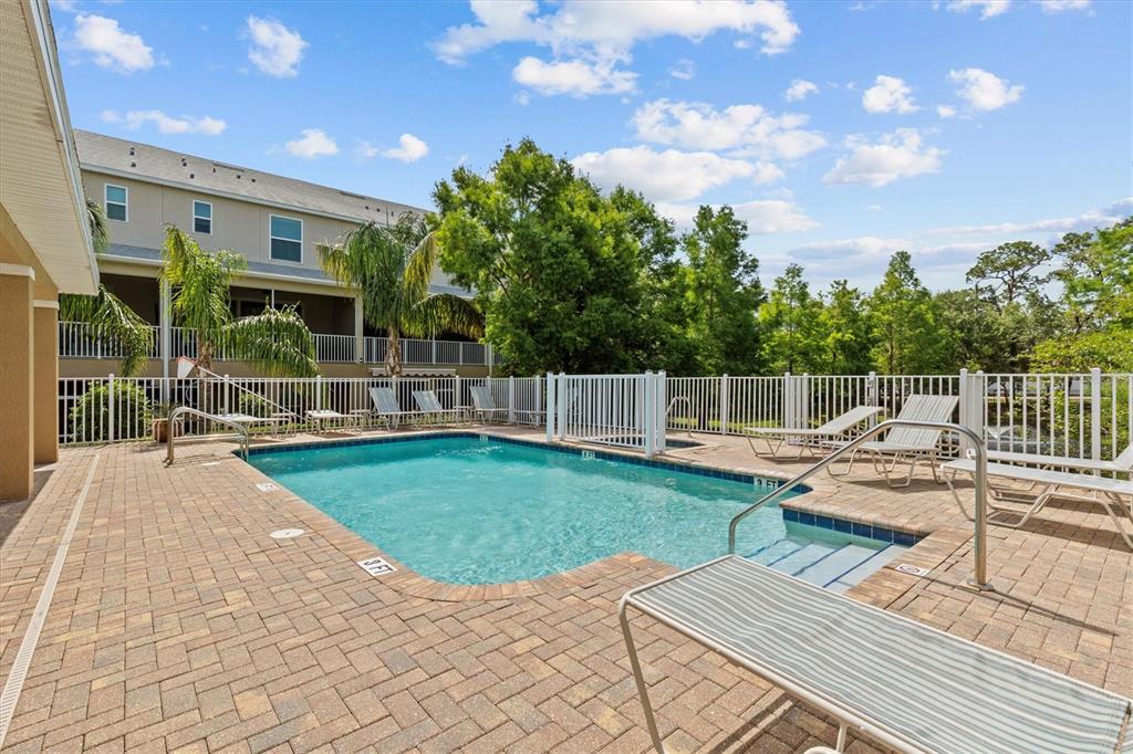 800 Callista Cay Loop Tarpon Springs, FL 34689 - Photo 33 of 36 a view of a backyard with sitting area