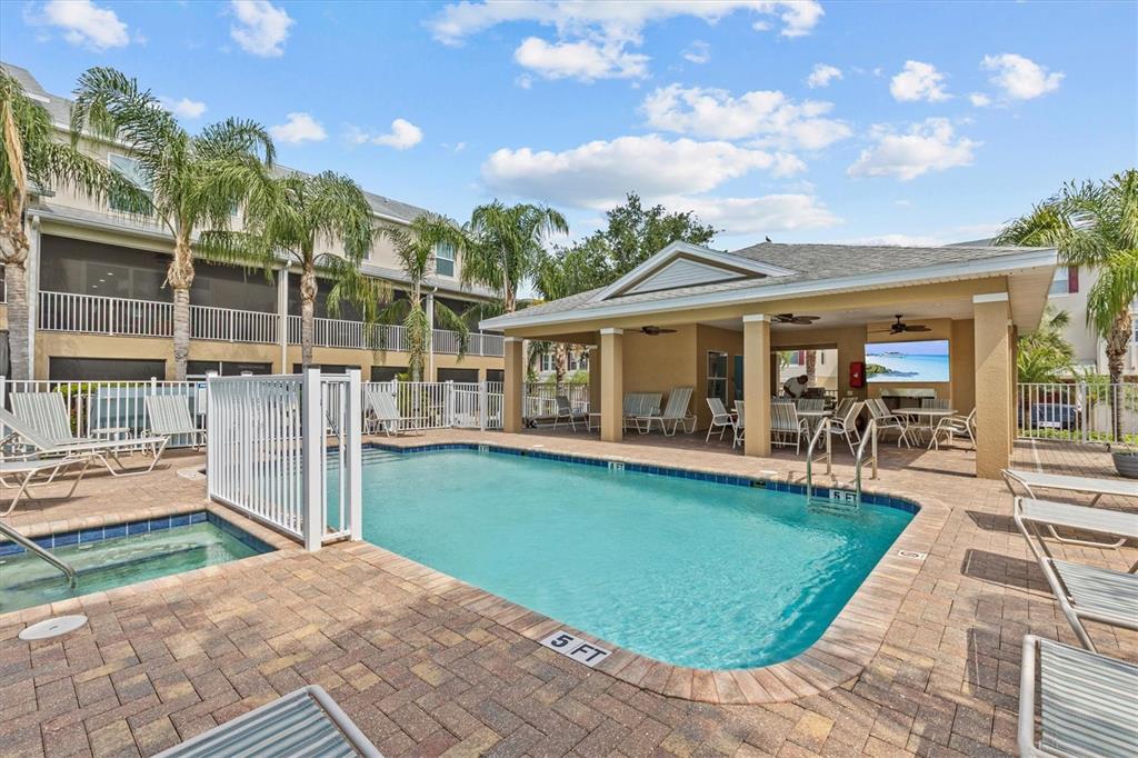800 Callista Cay Loop Tarpon Springs, FL 34689 - Photo 35 of 36 a view of a house with a backyard porch and sitting area