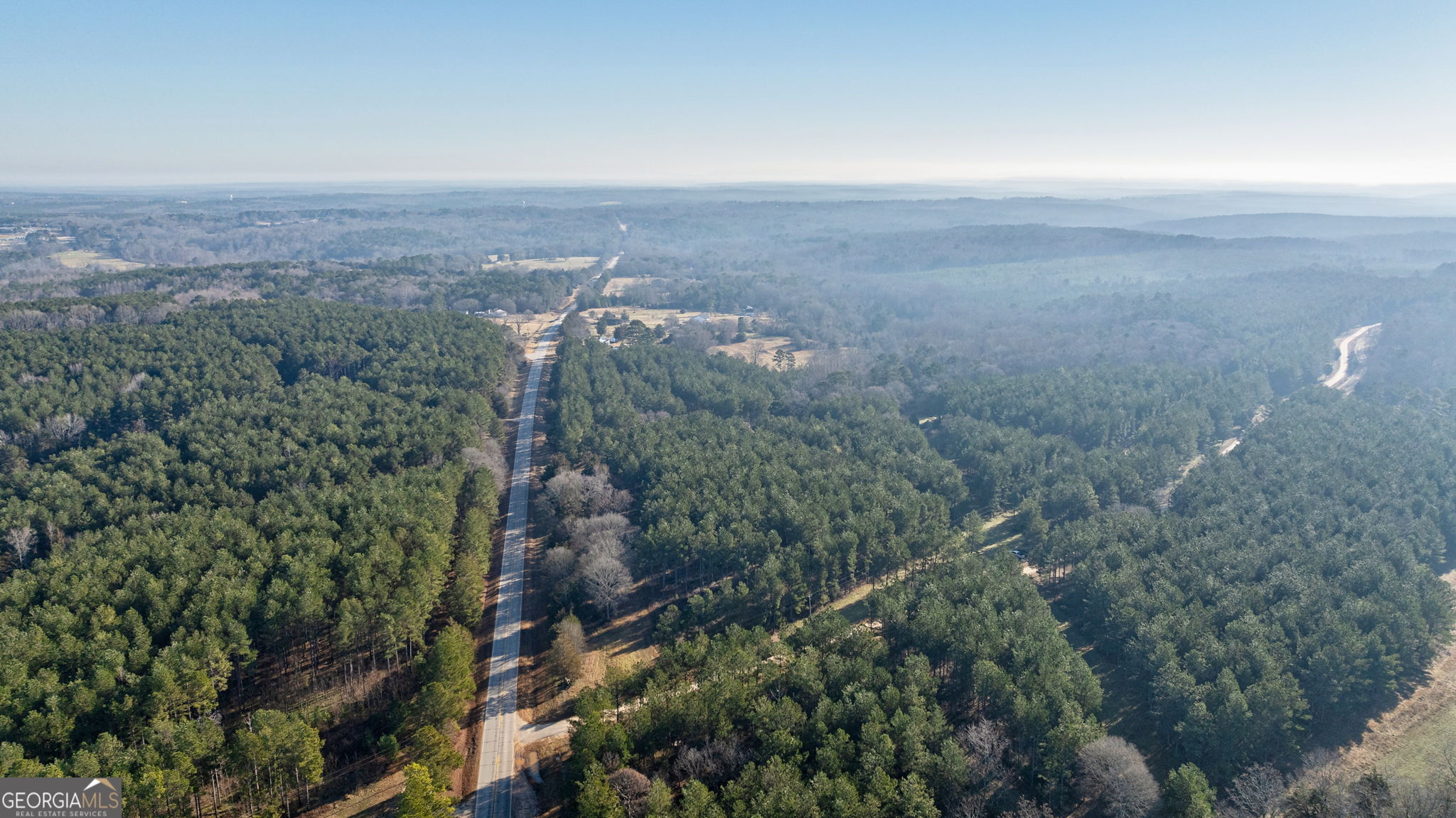 0 77th Highway Lexington, GA 30648 - Photo 9 of 10 an aerial view of house with yard and mountain view in back