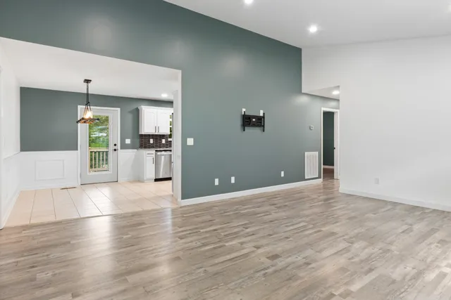 a view of a kitchen with a sink