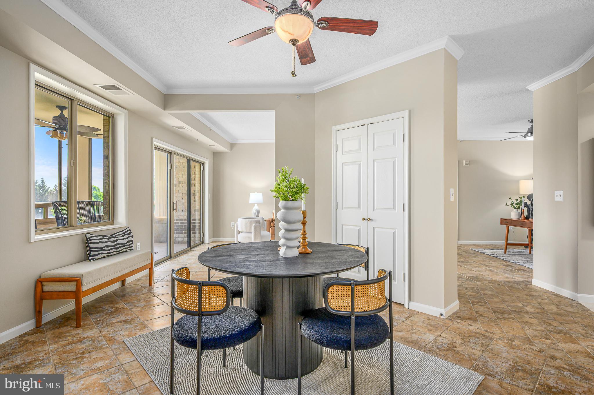 19375 Cypress Ridge Terrace, Unit 114 Leesburg, VA 20176 - Photo 14 of 42 a view of a dining room with furniture and window