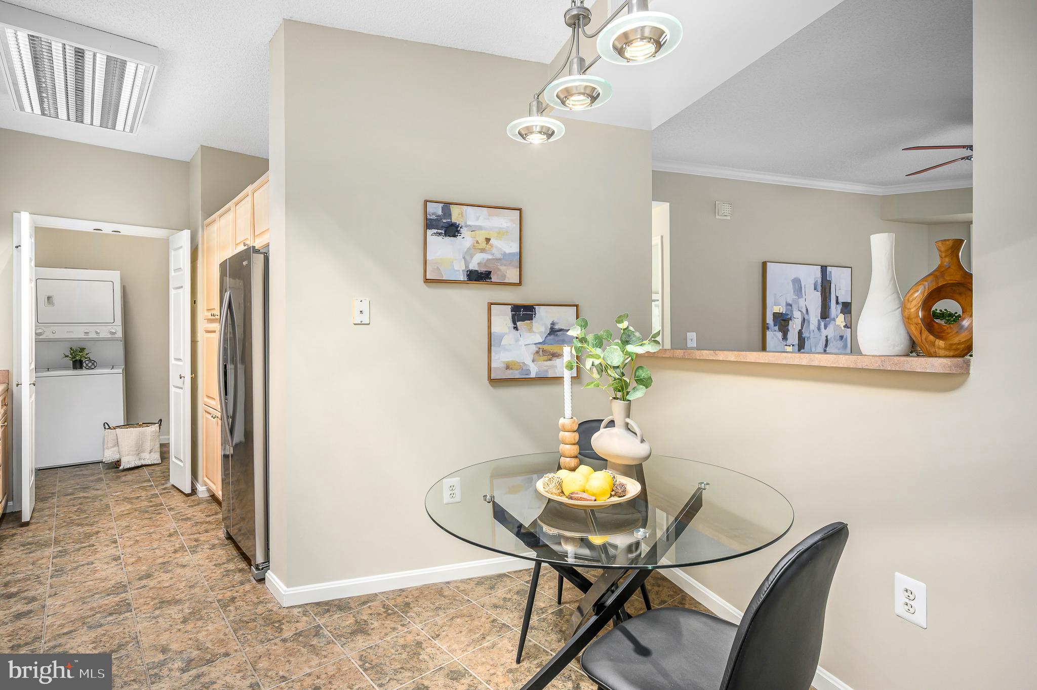 19375 Cypress Ridge Terrace, Unit 114 Leesburg, VA 20176 - Photo 17 of 42 a view of a dining room with furniture